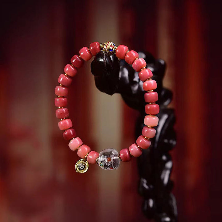 Bracelet porte-bonheur tibétain en Buddha Stones de chameau, cuivre et agate rouge