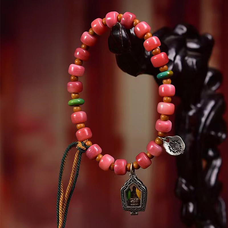 Bracelet porte-bonheur tibétain en Buddha Stones de chameau, cuivre et agate rouge