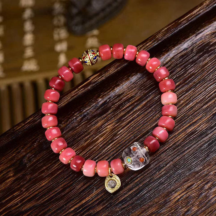 Bracelet porte-bonheur tibétain en Buddha Stones de chameau, cuivre et agate rouge
