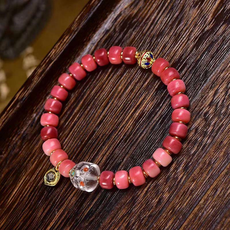 Bracelet porte-bonheur tibétain en Buddha Stones de chameau, cuivre et agate rouge