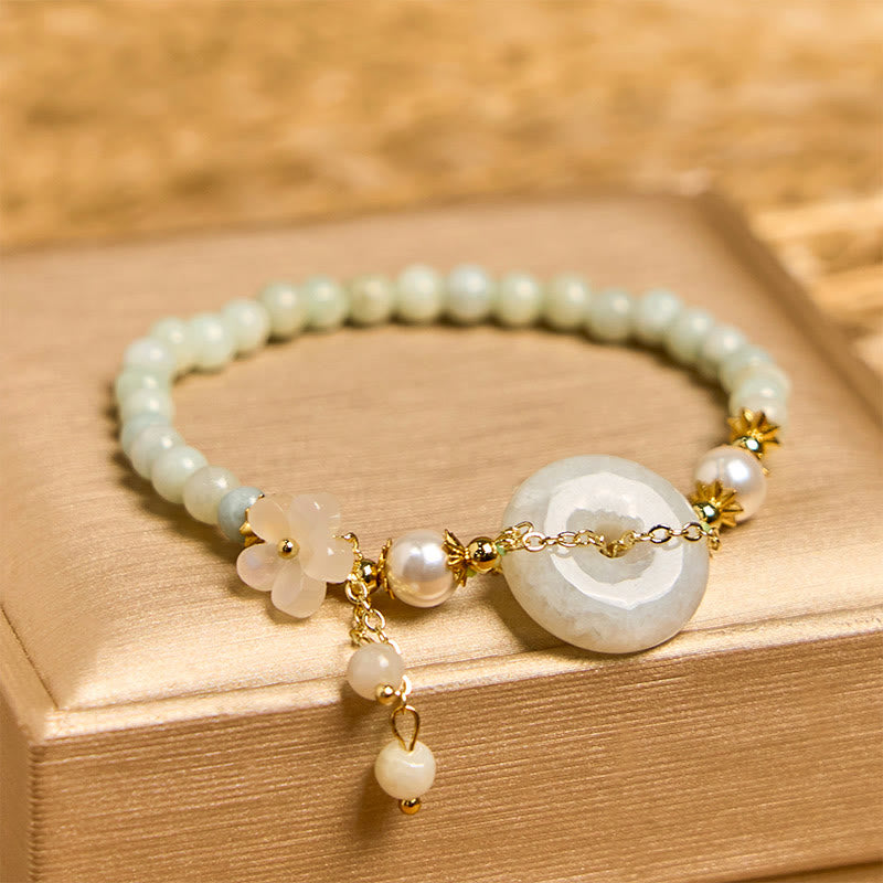 Bracelet de prospérité en perles de jade et Buddha Stones