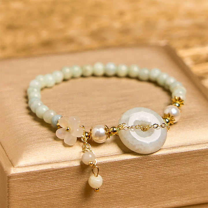Bracelet de prospérité en perles de jade et Buddha Stones