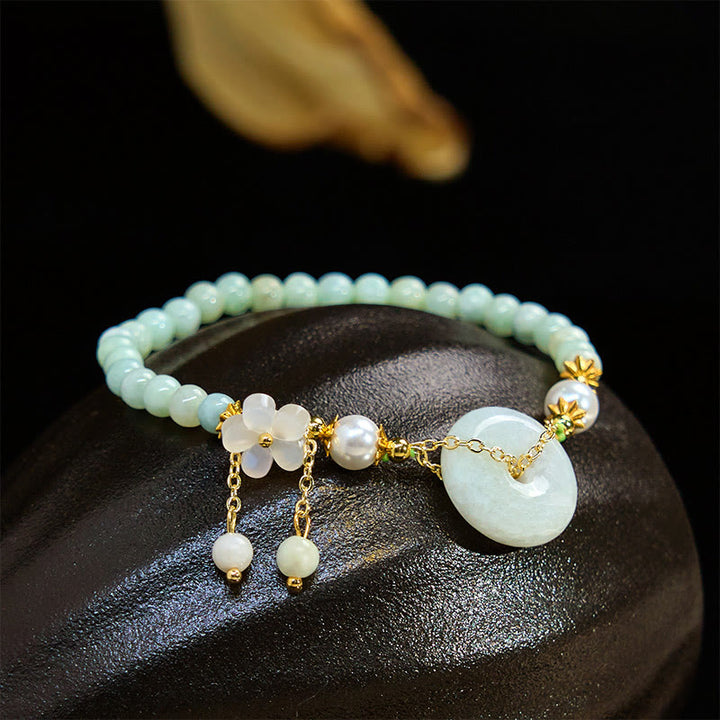 Bracelet de prospérité en perles de jade et Buddha Stones