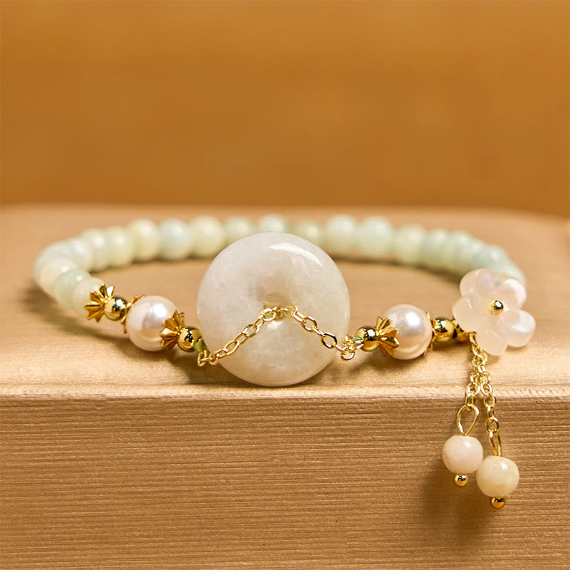 Bracelet de prospérité en perles de jade et Buddha Stones