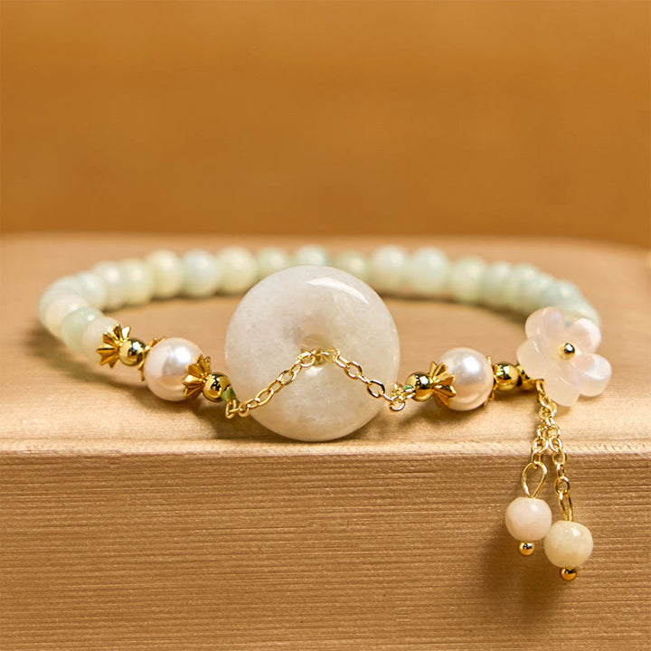 Bracelet de prospérité en perles de jade et Buddha Stones