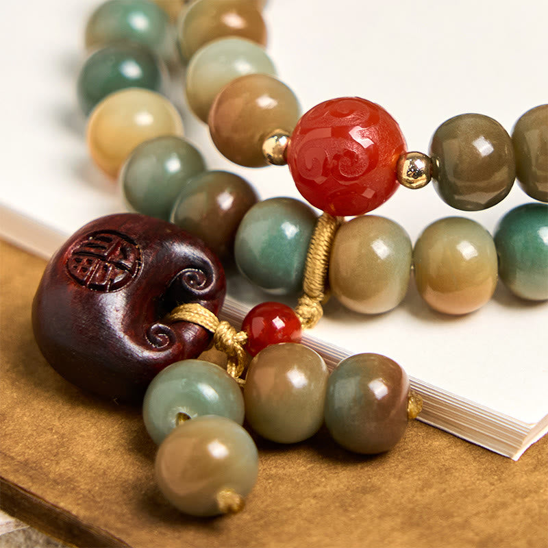 Bracelet double tour Harmonie aux graines de Bodhi colorées et aux Buddha Stones