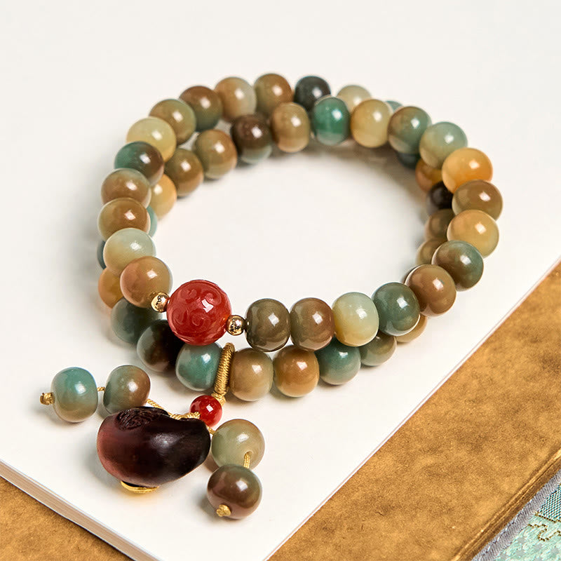 Bracelet double tour Harmonie aux graines de Bodhi colorées et aux Buddha Stones