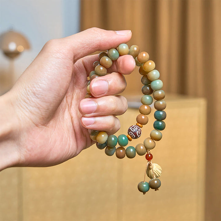 Bracelet double tour en Buddha Stones colorées, graines de Bodhi, gousse de lotus, breloque paix