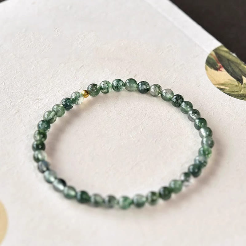Bracelet apaisant en perles porte-bonheur en agate mousse et Buddha Stones