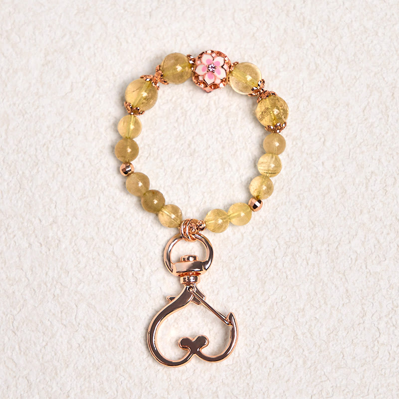 Porte-clés à suspendre en quartz rutile doré et Buddha Stones