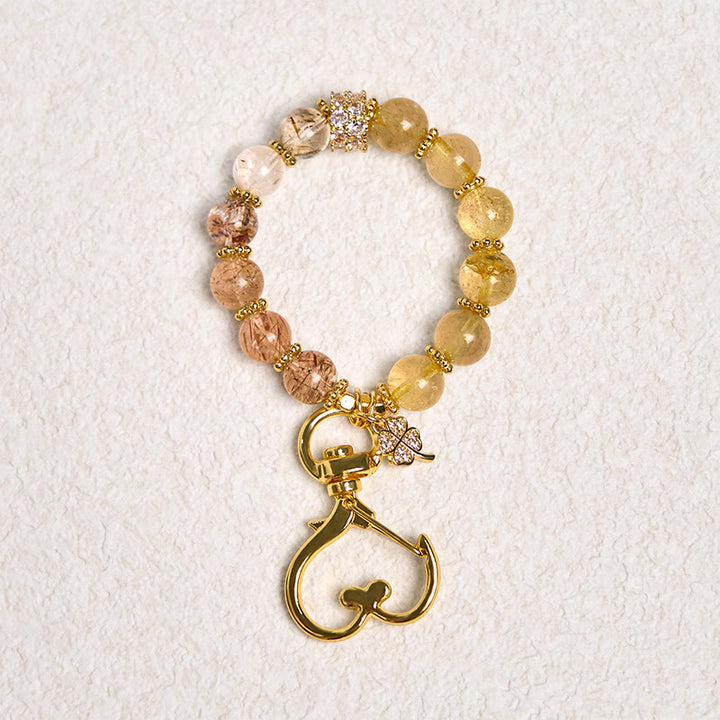 Porte-clés décoratif suspendu en quartz rutile doré et Buddha Stones