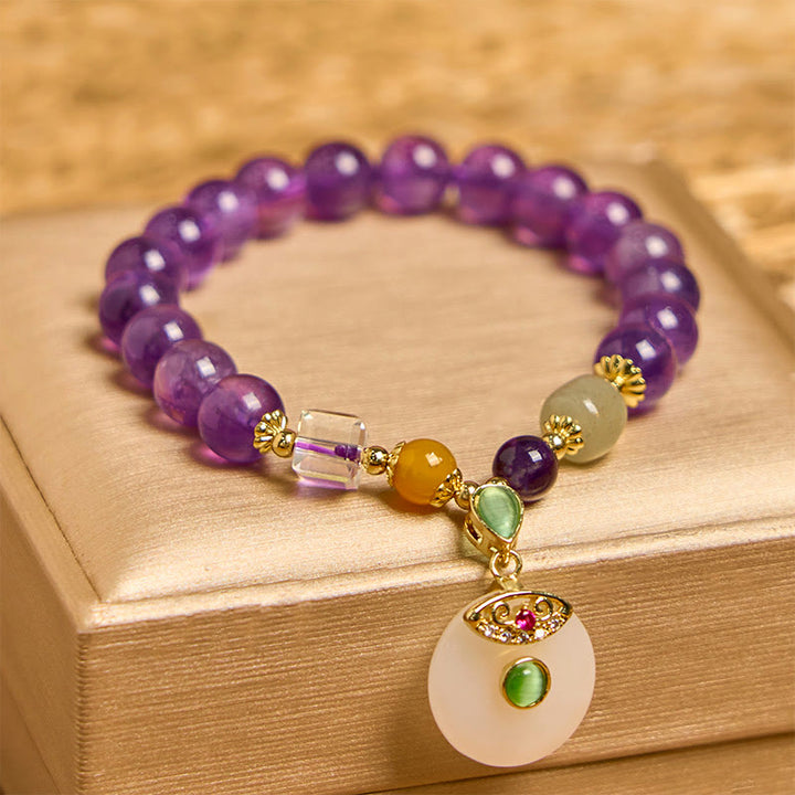 Bracelet spirituel avec breloque en améthyste naturelle et Buddha Stones