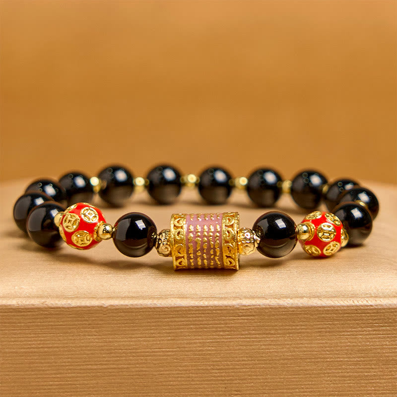 Bracelet porte-bonheur en Buddha Stones noir naturel et cinq pièces de cuivre sacrées
