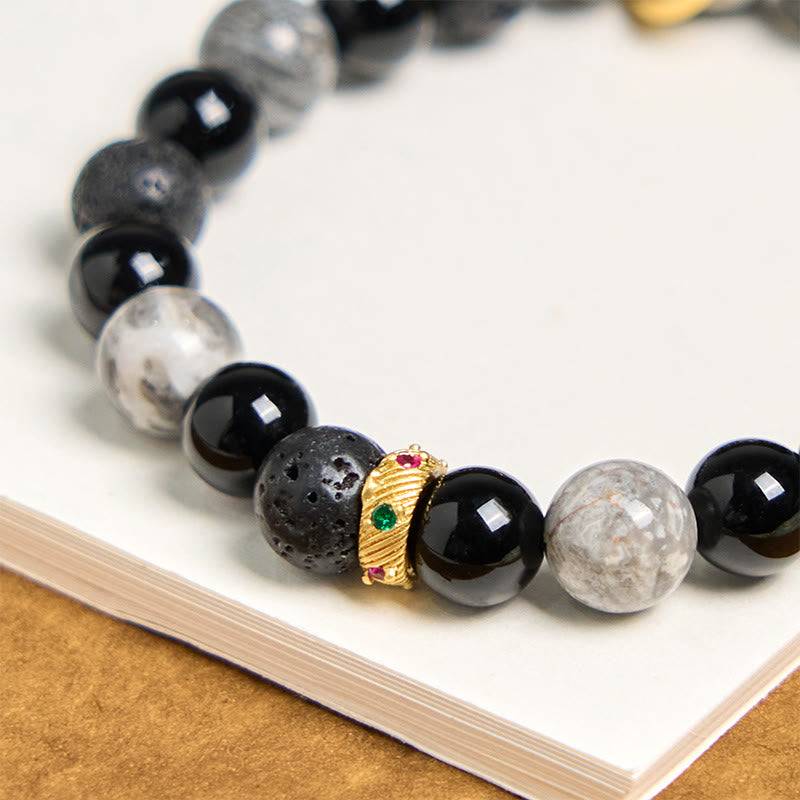 Bracelet de guérison en Buddha Stones de lave, onyx noir, jaspe Picasso