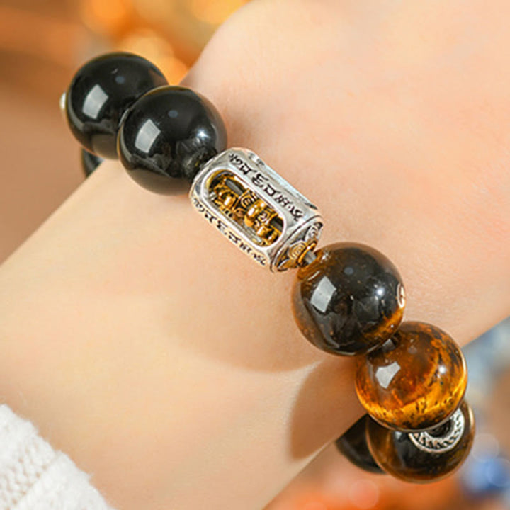 Bracelet de protection Vajra en obsidienne Buddha Stones de tigre et argent naturel