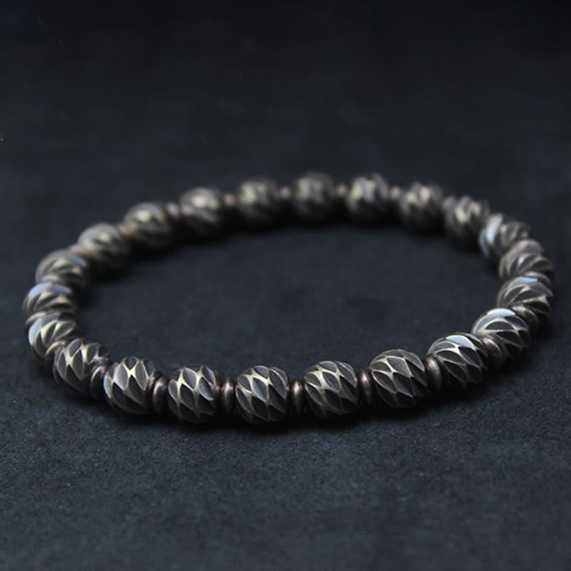 Bracelet de richesse en perles de cuivre et laiton, motif de couteau sculpté vintage en Buddha Stones