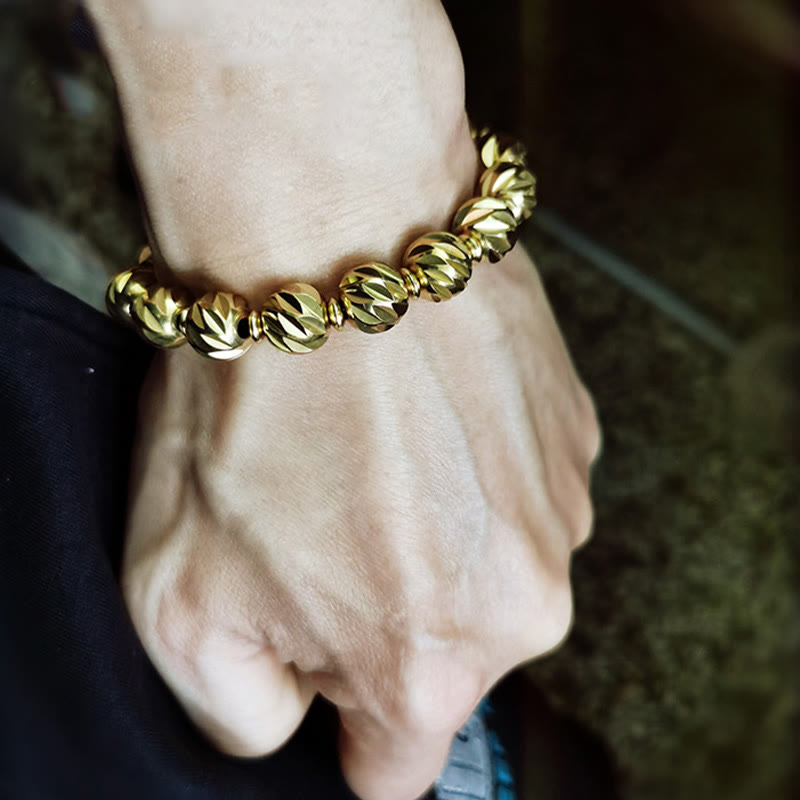 Bracelet de richesse en perles de cuivre et laiton, motif de couteau sculpté vintage en Buddha Stones
