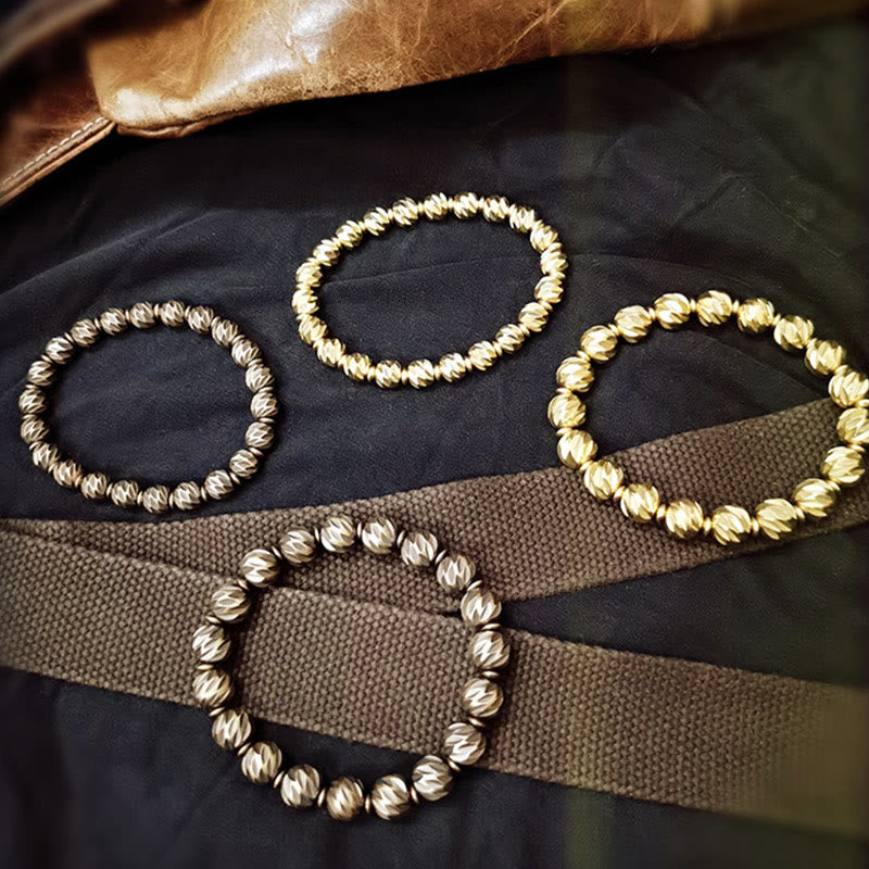 Bracelet de richesse en perles de cuivre et laiton, motif de couteau sculpté vintage en Buddha Stones
