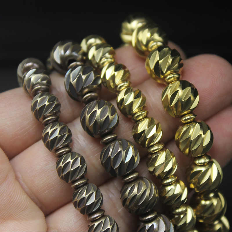 Bracelet de richesse en perles de cuivre et laiton, motif de couteau sculpté vintage en Buddha Stones