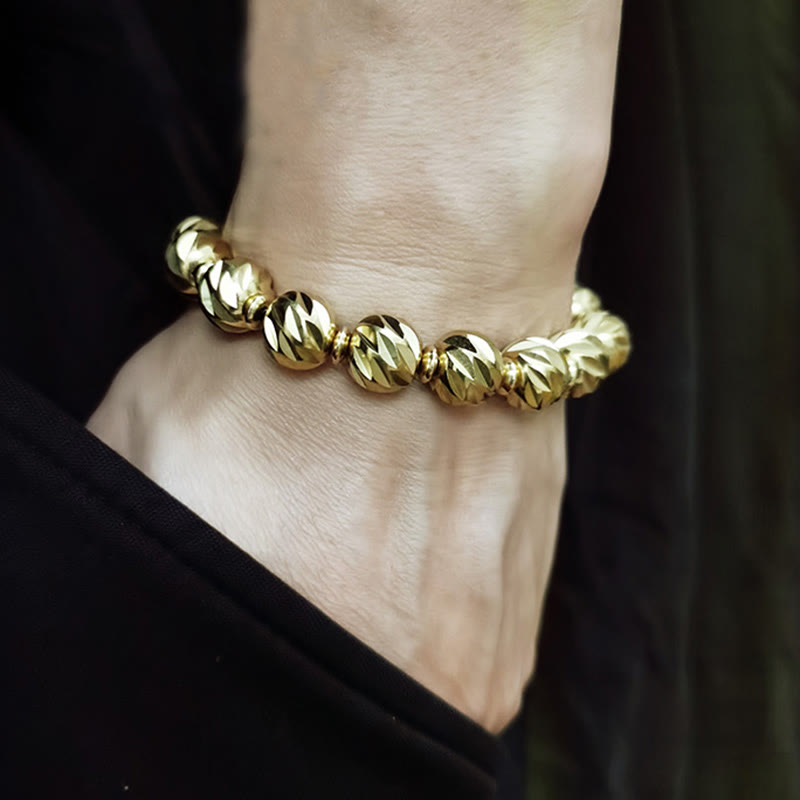 Bracelet de richesse en perles de cuivre et laiton, motif de couteau sculpté vintage en Buddha Stones
