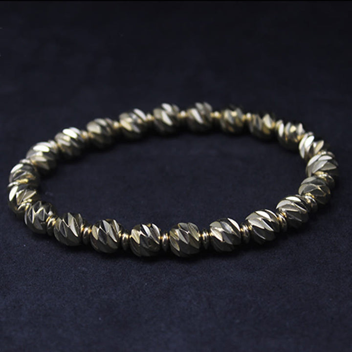 Bracelet de richesse en perles de cuivre et laiton, motif de couteau sculpté vintage en Buddha Stones