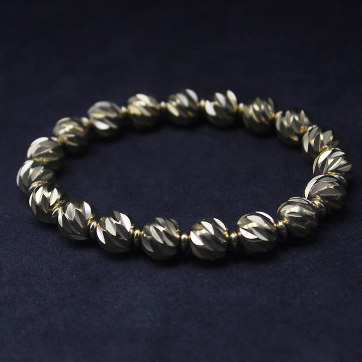 Bracelet de richesse en perles de cuivre et laiton, motif de couteau sculpté vintage en Buddha Stones