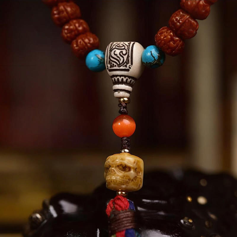Mala à pampilles et graines de Bodhi en Buddha Stones de Rudraksha