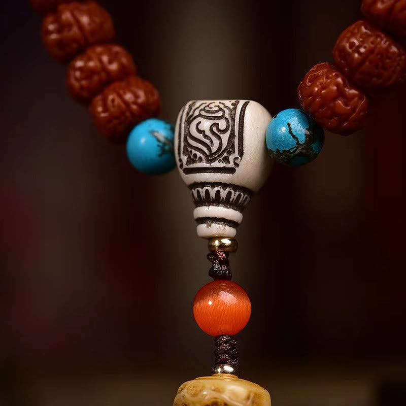 Mala à pampilles et graines de Bodhi en Buddha Stones de Rudraksha