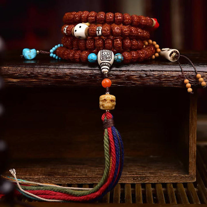 Mala à pampilles et graines de Bodhi en Buddha Stones de Rudraksha