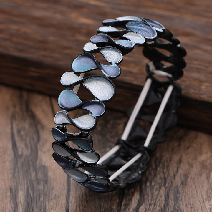 Bracelet élastique de guérison en alliage creux coloré en forme de 8 Buddha Stones