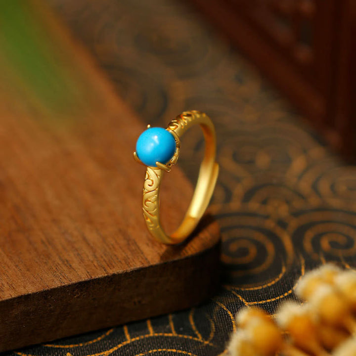 Bague ajustable en cuivre turquoise avec Buddha Stones au design simple