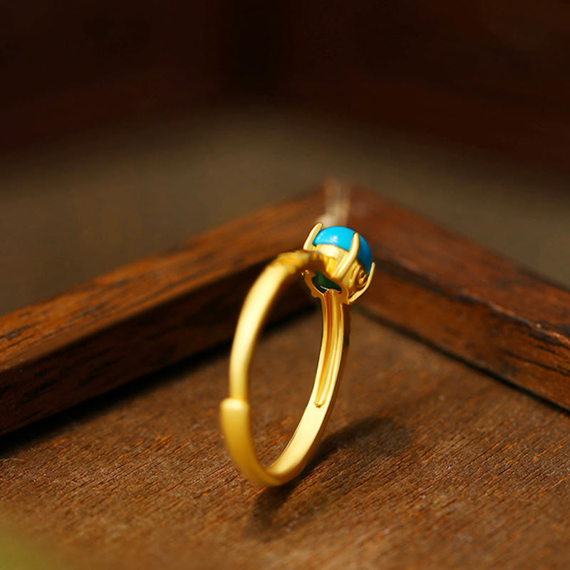 Bague ajustable en cuivre turquoise avec Buddha Stones au design simple