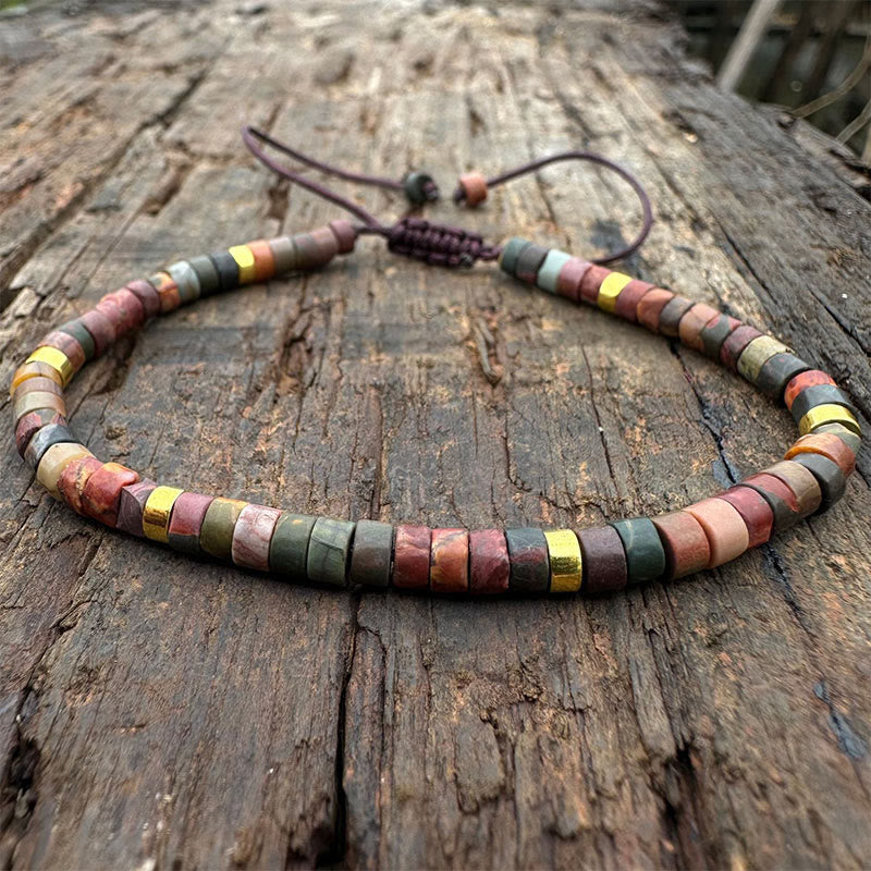Bracelet de perles d'espacement en rhodonite et Buddha Stones pour la guérison des relations