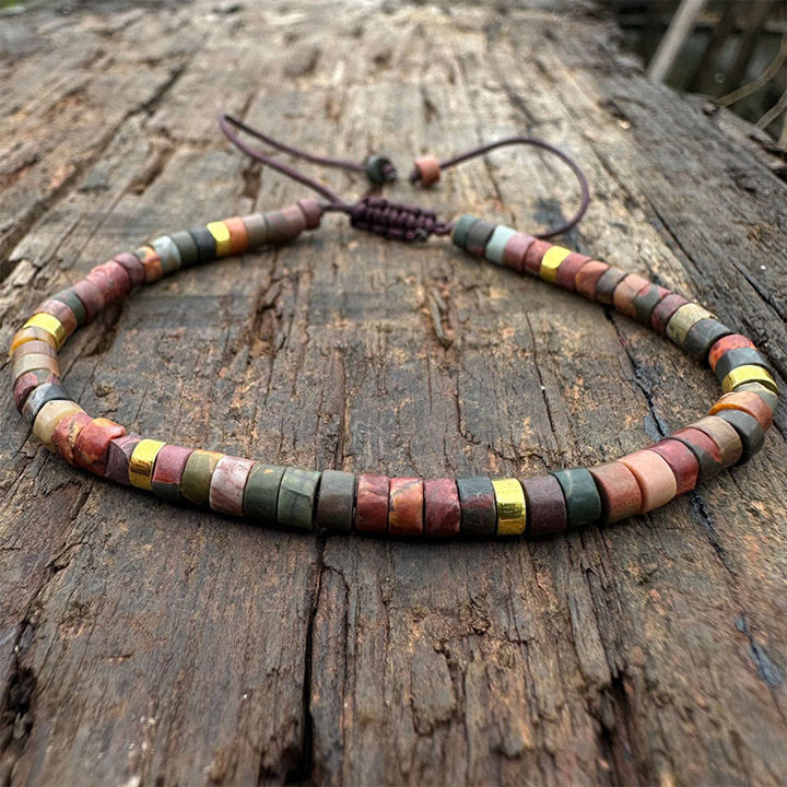 Bracelet de perles d'espacement en rhodonite et Buddha Stones pour la guérison des relations