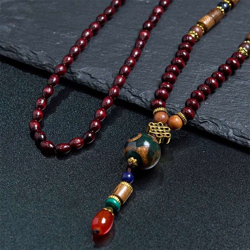 Collier pendentif tête d'éléphant en perles dzi de protection en bois de wengé Buddha Stones fait main