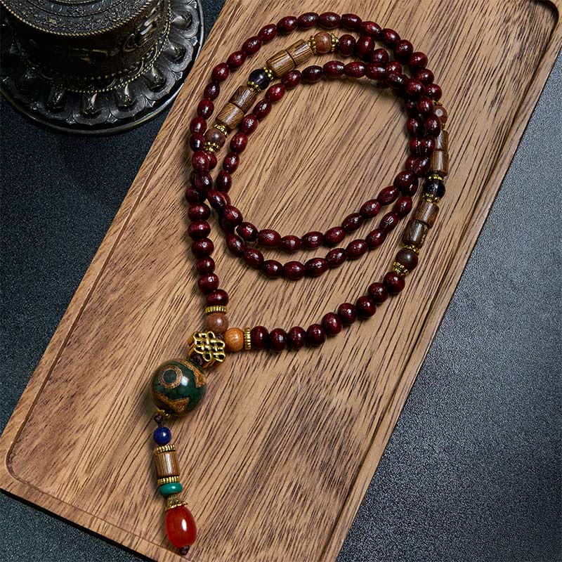 Collier pendentif tête d'éléphant en perles dzi de protection en bois de wengé Buddha Stones fait main