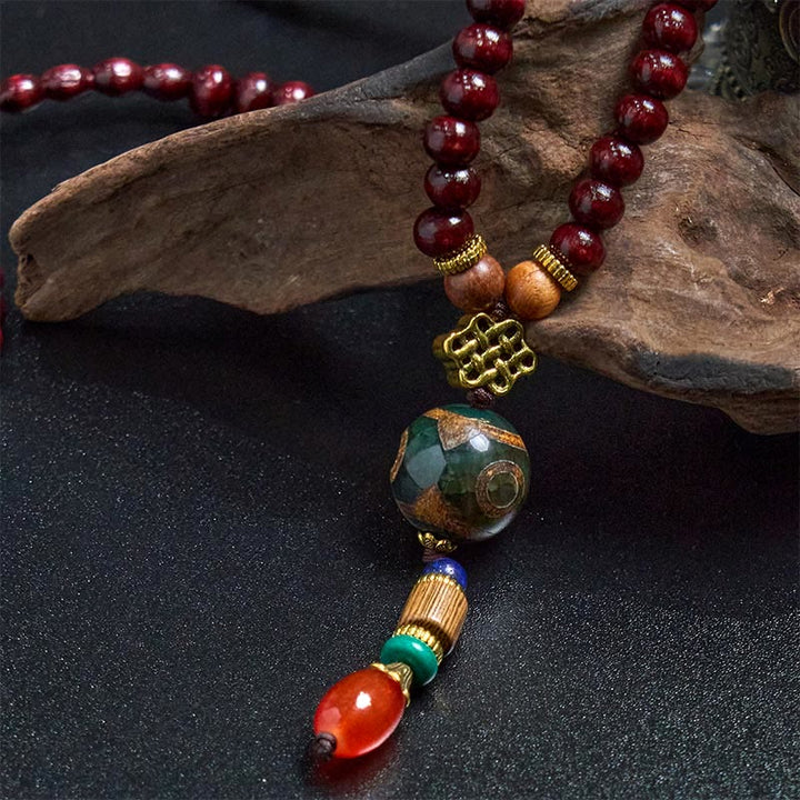 Collier pendentif tête d'éléphant en perles dzi de protection en bois de wengé Buddha Stones fait main