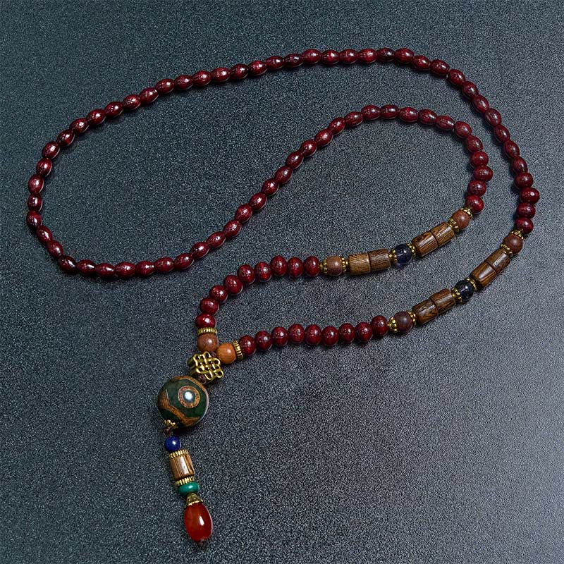 Collier pendentif tête d'éléphant en perles dzi de protection en bois de wengé Buddha Stones fait main