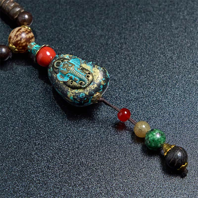 Collier pendentif tête d'éléphant en perles dzi de protection en bois de wengé Buddha Stones fait main