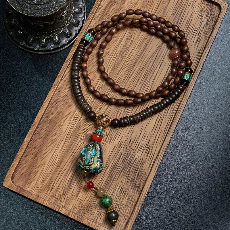 Collier pendentif tête d'éléphant en perles dzi de protection en bois de wengé Buddha Stones fait main