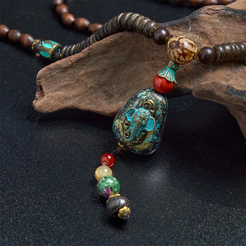 Collier pendentif tête d'éléphant en perles dzi de protection en bois de wengé Buddha Stones fait main