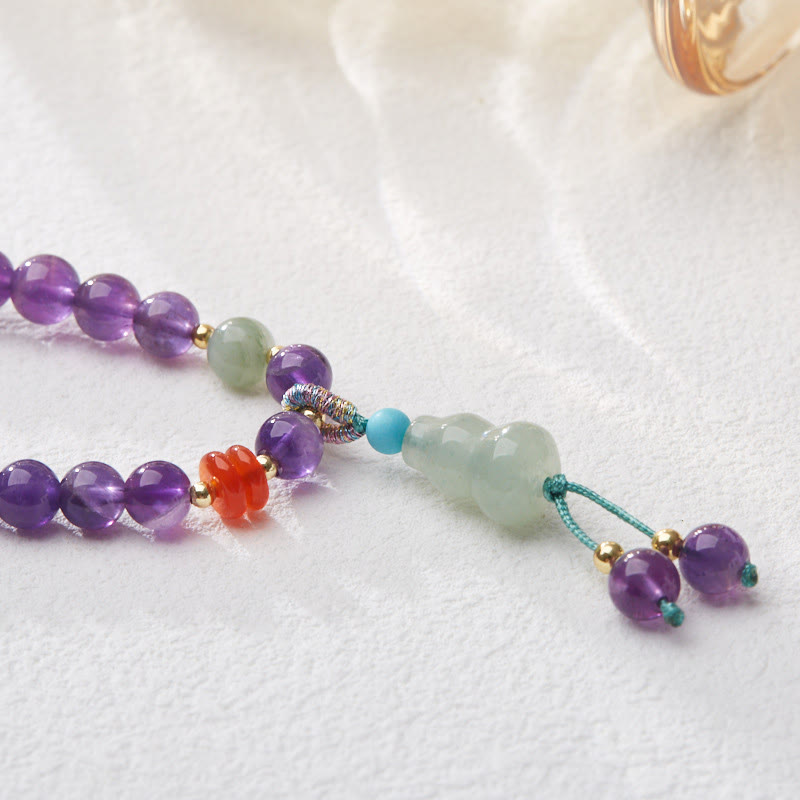 Bracelet multicouche en Buddha Stones, perles d'améthyste naturelle, pièce de monnaie suspendue, calcédoine, lotus, équilibre