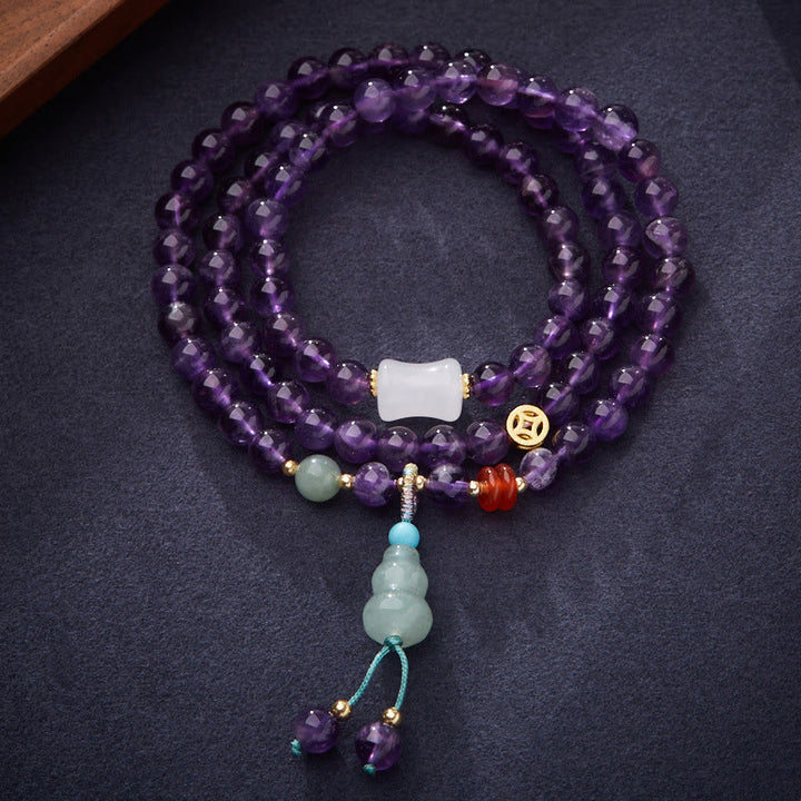 Bracelet multicouche en Buddha Stones, perles d'améthyste naturelle, pièce de monnaie suspendue, calcédoine, lotus, équilibre