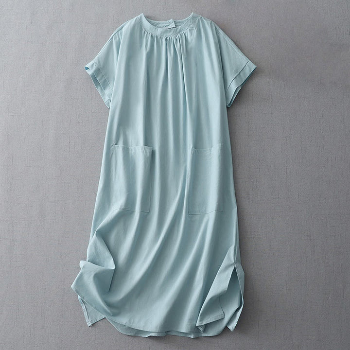 Robe mi-longue décontractée en coton et lin avec boutons au dos, couleur pure, col ras du cou, manches courtes et poches