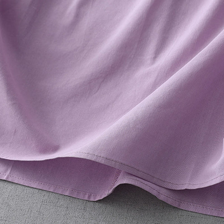 Robe mi-longue décontractée en coton et lin avec boutons au dos, couleur pure, col ras du cou, manches courtes et poches