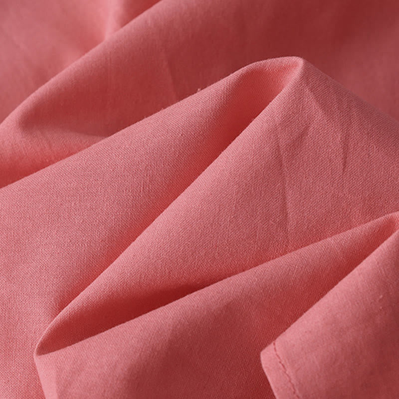 Robe mi-longue décontractée en coton et lin avec boutons au dos, couleur pure, col ras du cou, manches courtes et poches