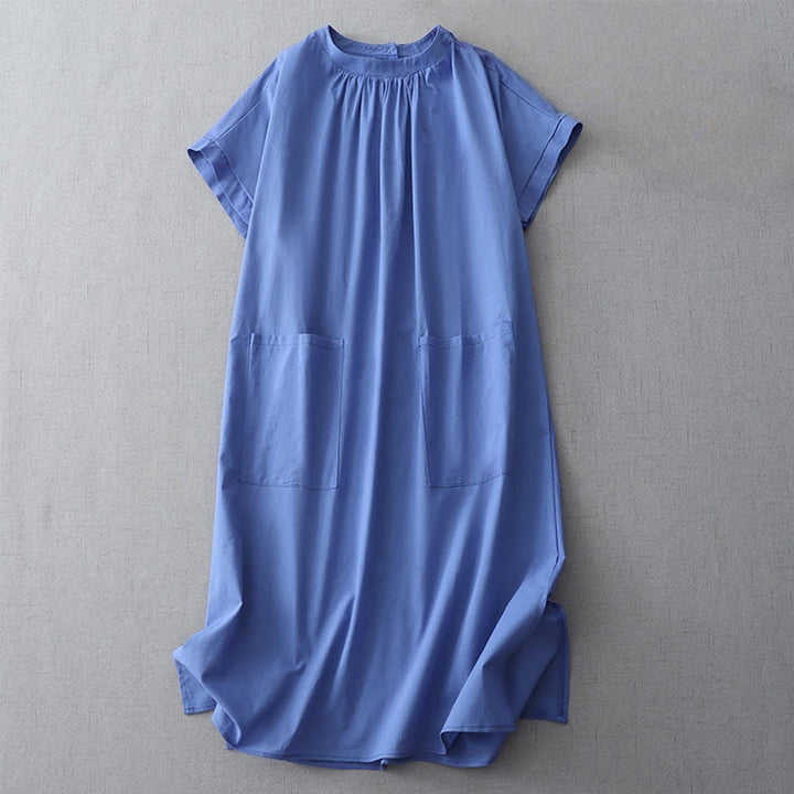 Robe mi-longue décontractée en coton et lin avec boutons au dos, couleur pure, col ras du cou, manches courtes et poches