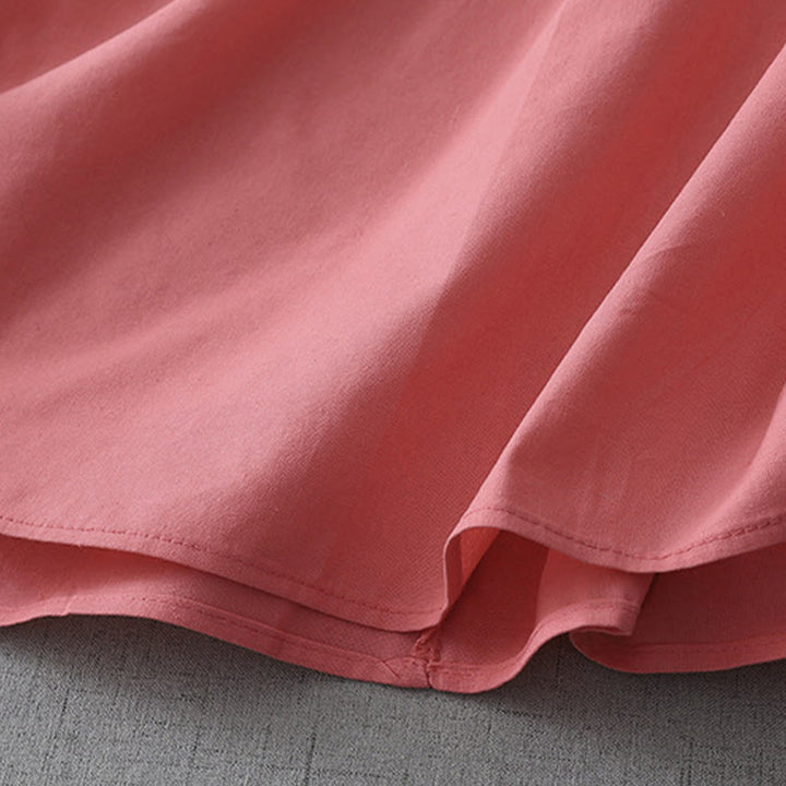 Robe mi-longue décontractée en coton et lin avec boutons au dos, couleur pure, col ras du cou, manches courtes et poches