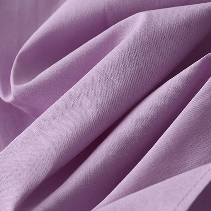 Robe mi-longue décontractée en coton et lin avec boutons au dos, couleur pure, col ras du cou, manches courtes et poches