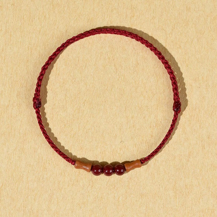 Bracelet de bénédiction en perles de cinabre et bois de pêcher, Buddha Stones